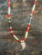 picture of the bear claw necklace in this story