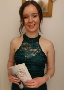 Students with teachers holding awards