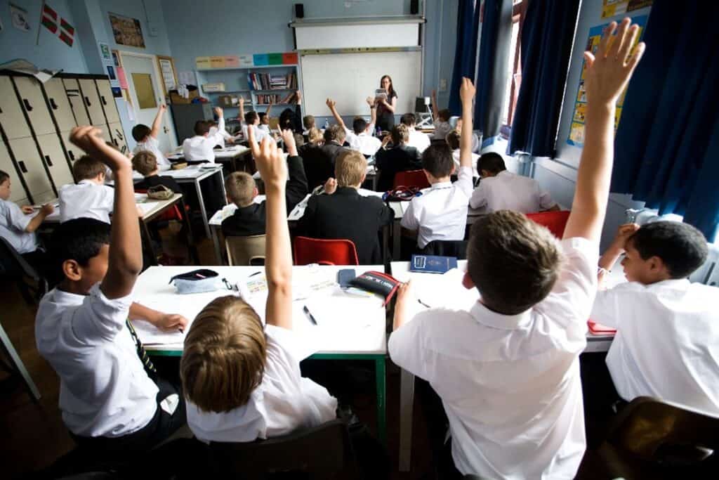 Students in back of a classroom