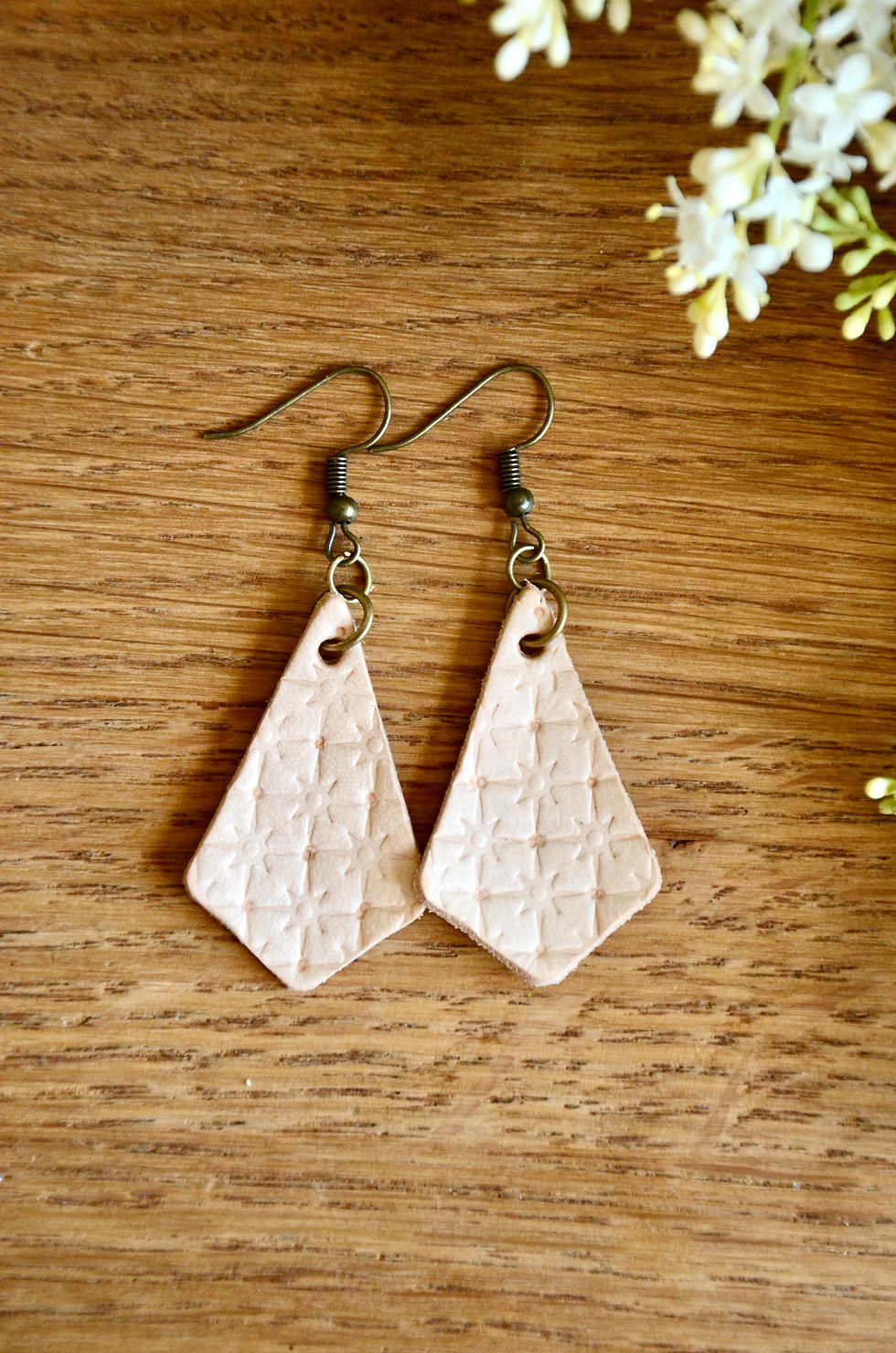 Thumbnail: Northern Star hand tooled leather earrings