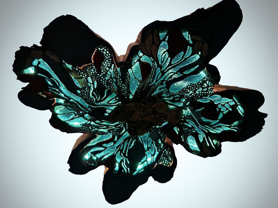 Stone, carved wood, and sea glass art with backlight only