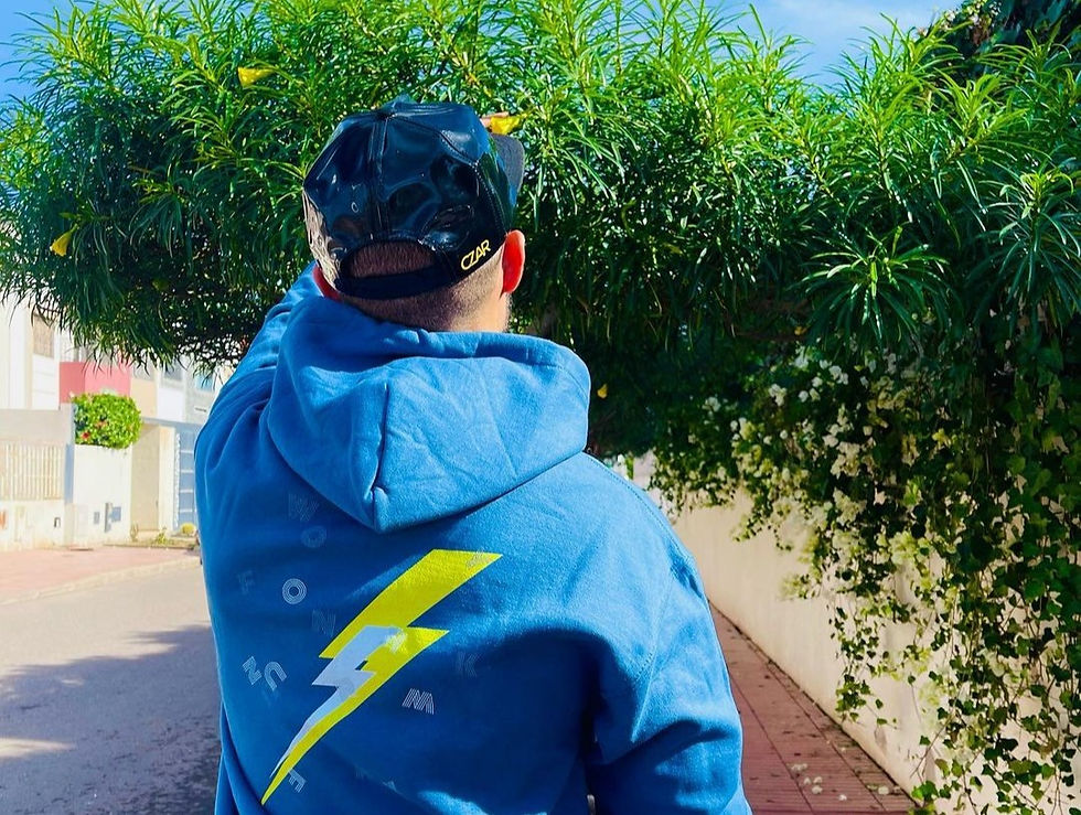Youssef Taha wearing Funky Storm Hoodie