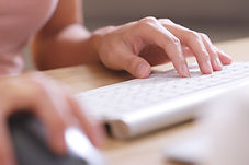 hands-typing-on-computer-keyboard-and-use-of-mouse-DD7H5EG.jpeg
