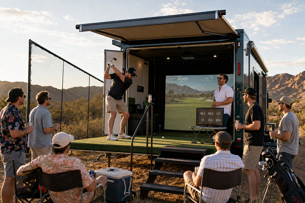 A group of men gathers around a mobile golf simulator trailer during a bachelor party at sunset. One man swings from an elevated turf deck while the others watch, laugh, and hold drinks, with a projected golf course, shot-tracking monitor, chairs, cooler, golf bags, and desert mountains in the background.
