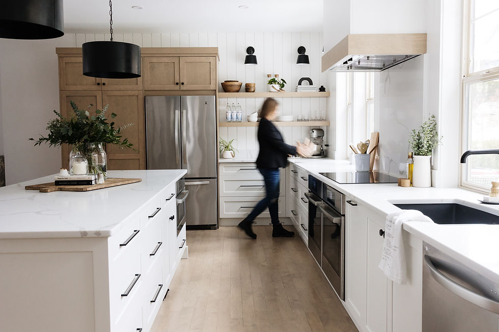Modern custom kitchen renovation in West Kelowna featuring white quartz countertops and minimalist cabinetry