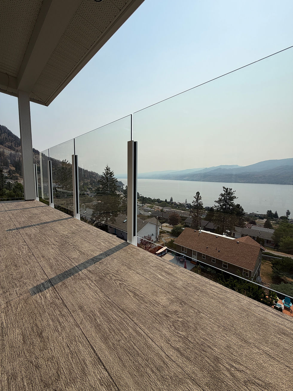 Custom outdoor deck construction and aluminum railings built in Summerland