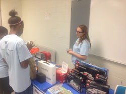 Mattie working the Camp iCare store