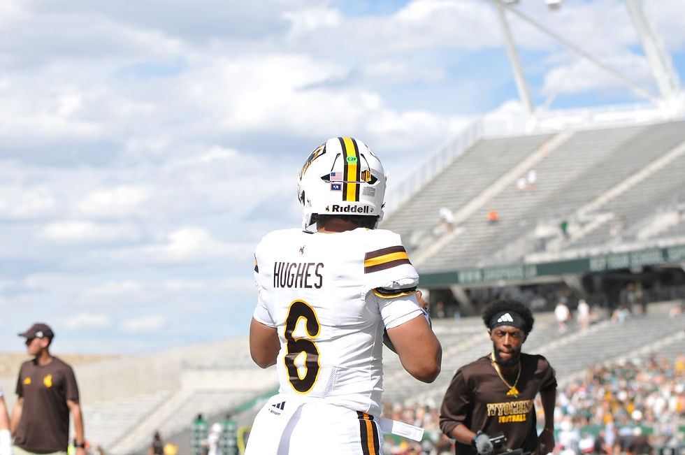 Wyoming quarterback Tyler Hughes takes the field before the Cowboys’ game against Colorado State on Saturday, Sept. 5, 2026, at Canvas Stadium. Photo by Jeff Bugher, PokesNews.com.