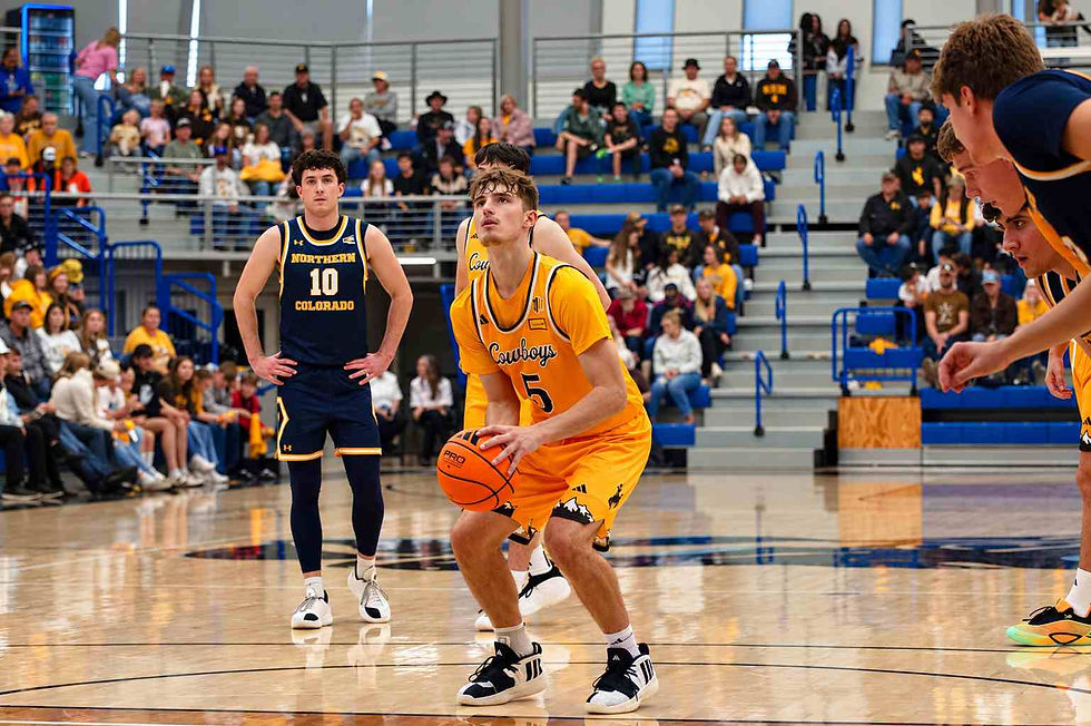 Wyoming guard Madden Smiley (#5) prepares to shoot a free throw during an exhibition game against Northern Colorado in Gillette, Wyoming. Photo by Jeff Bugher, PokesNews.com.