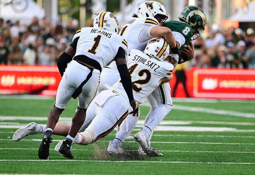 Wyoming defender Ethan Stuhlsatz tackles a Colorado State ball carrier in the Border War on Saturday, Sept. 5, 2026, at Canvas Stadium. Photo courtesy of UW Athletics.