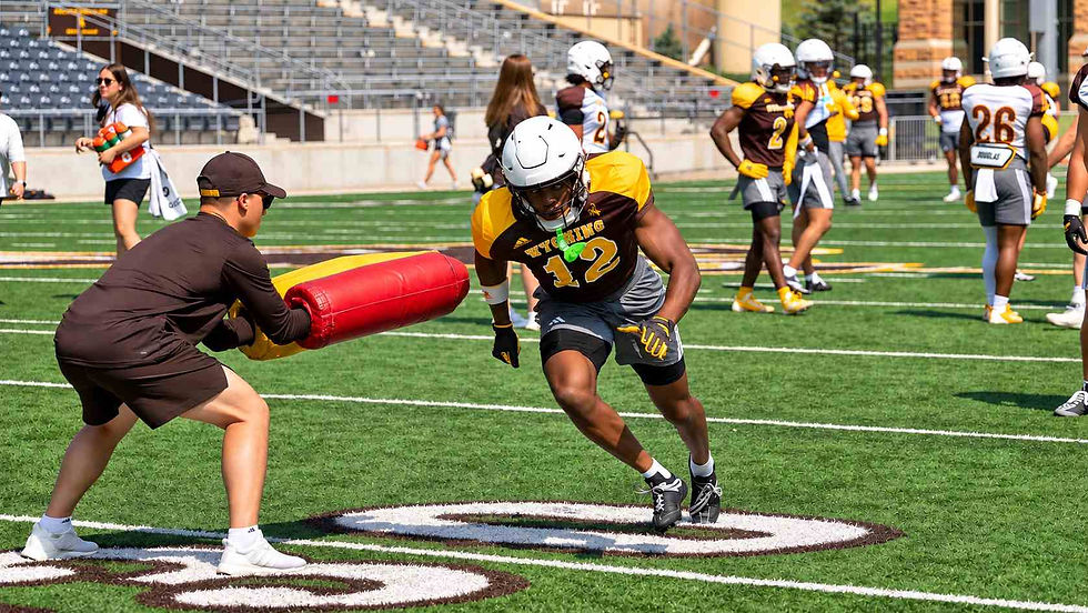Kendal Griffin does a drill during fall camp at War Memorial Stadium. Photo courtesy of UW Athletics