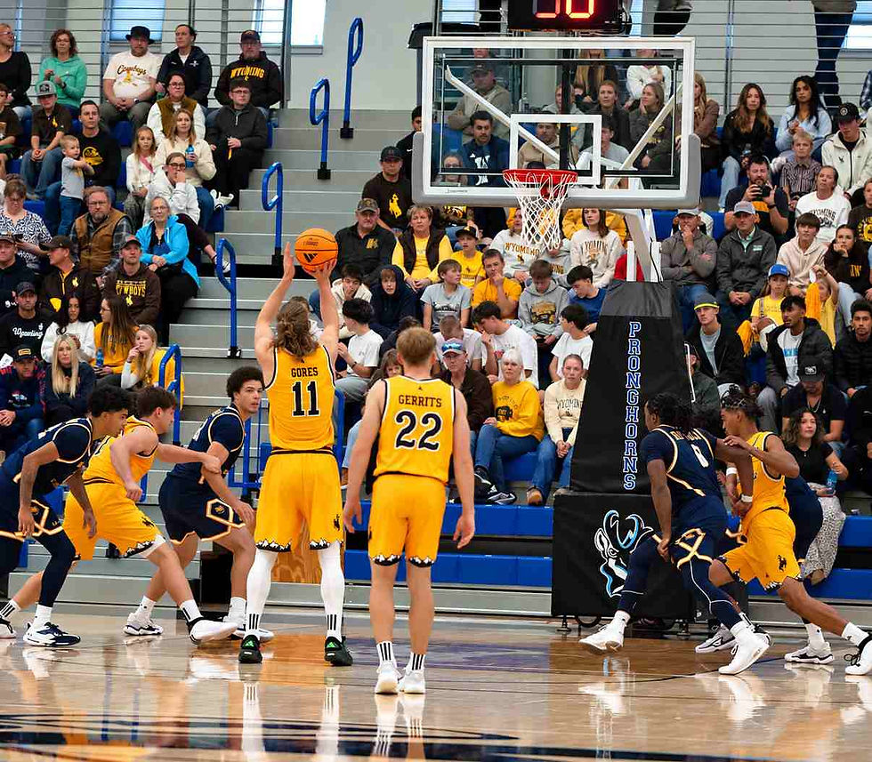 Wyoming forward Gavin Gores (#11) attempts a free throw during an exhibition game against Northern Colorado in Gillette, Wyoming. Photo by Jeff Bugher, PokesNews.com.