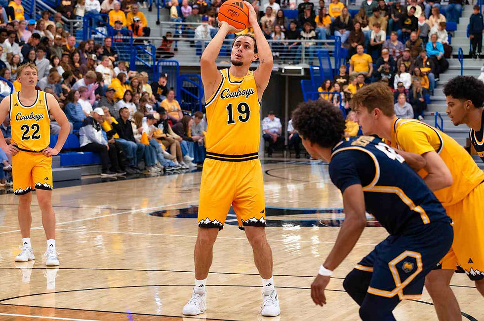 Wyoming center Linus Ruf (#19) prepares to shoot a free throw during an exhibition game against Northern Colorado in Gillette, Wyoming. Photo by Jeff Bugher, PokesNews.com.