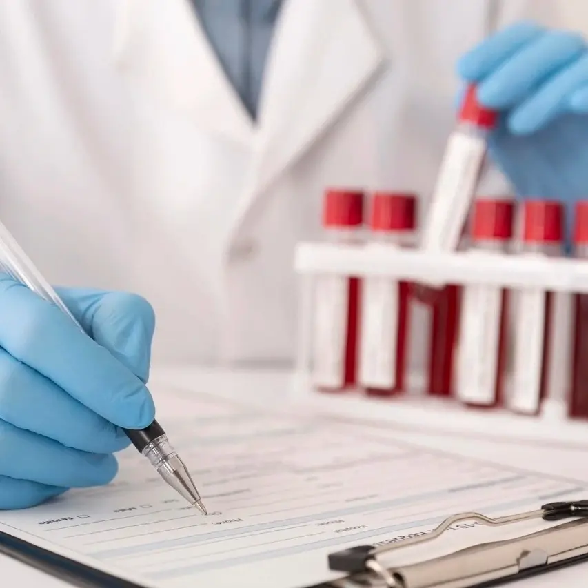 examining-blood-sample-with-microscope