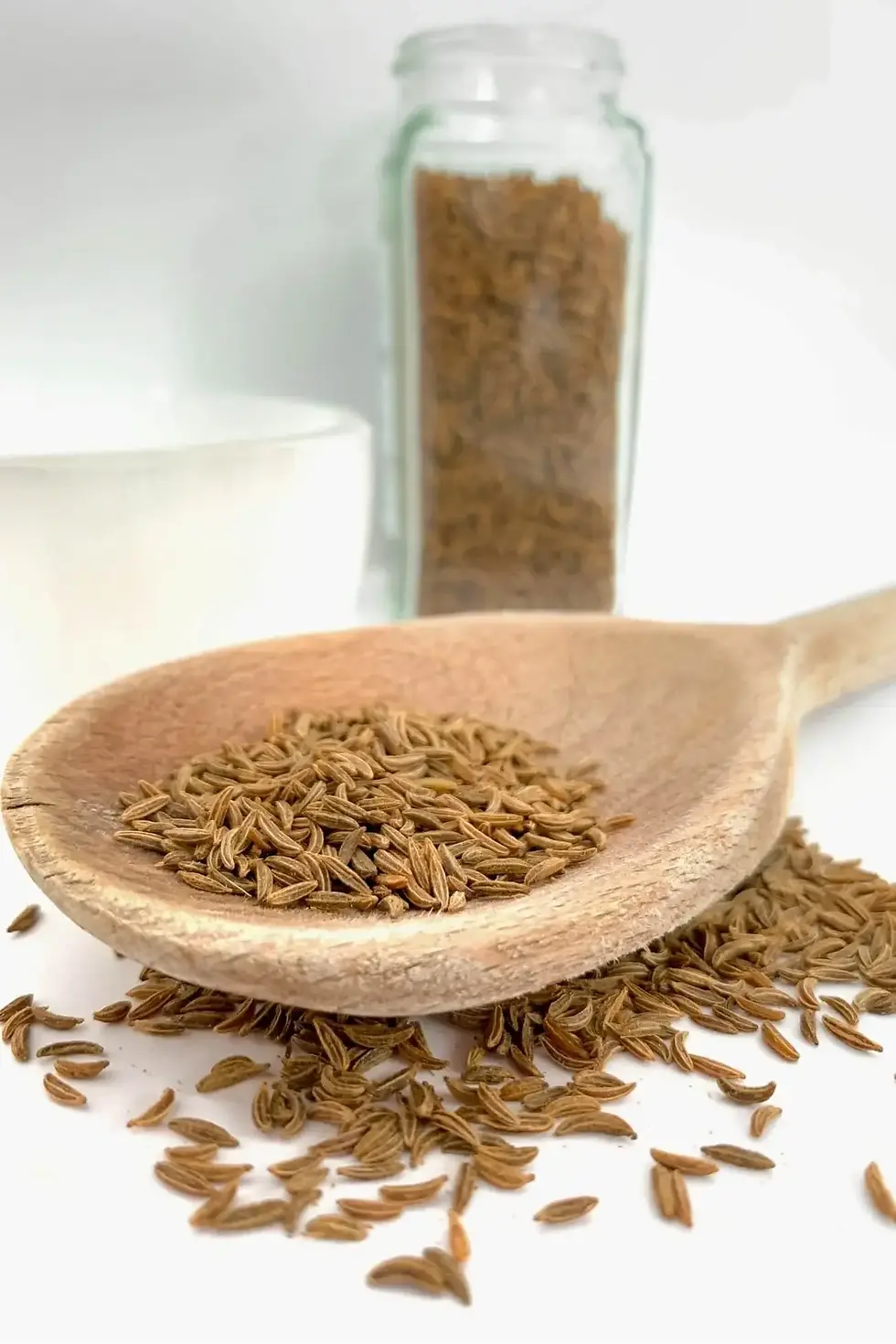 Wooden spoon of caraway seeds