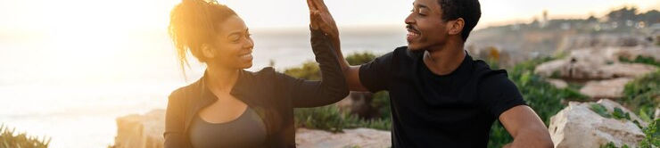 cheerful-young-african-american-couple-sportswear-enjoy-workout-practice-yoga-give-high-fi