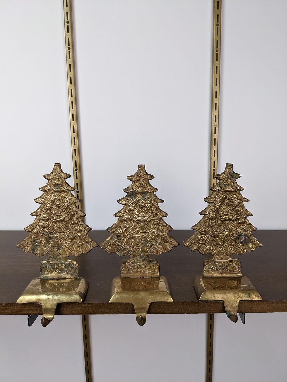 Thumbnail: Set of Three MCM Brass Christmas Tree Stocking Holders