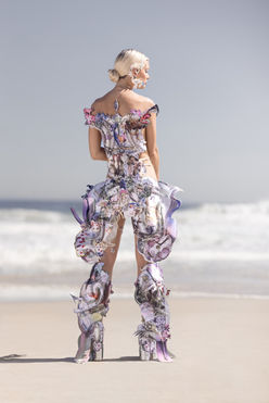 Chelsea Jean Lamm & Ashley Elizabeth Lamm – The Future of Sustainable Avant-Garde Couture
Discover the visionary world of Chelsea Jean Lamm & Ashley Elizabeth Lamm, a high-end couture duo with South African and German roots, redefining wearable art and sustainable luxury fashion. Their avant-garde creations fuse heritage craftsmanship, innovative textile techniques, and cutting-edge materials, making them a rising force in the future of fashion.
Each garment is a masterpiece of sustainability and artistry, featuring reclaimed print media, dead-stock silk, intricate hand embroidery, and experimental fabric manipulation. Chelsea’s couture designs embrace bold silhouettes and sculptural forms, while Ashley’s analogue collage techniques transform discarded materials into layered, textural storytelling.
Their work represents a new era of luxury fashion, where sustainability, innovation, and avant-garde design merge seamlessly. From laser-cut detailing to eco-conscious embellishments, every piece reflects a commitment to modern craftsmanship and ethical production.
For those seeking trendy, high-end, and concept-driven couture, their collections are the epitome of sustainable luxury. Explore their wearable art, statement couture, and fashion-forward designs—crafted for individuals who embrace artistic expression and the evolution of high fashion.