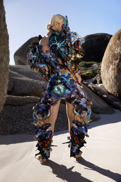 Chelsea Jean Lamm & Ashley Elizabeth Lamm – The Future of Sustainable Avant-Garde Couture
Discover the visionary world of Chelsea Jean Lamm & Ashley Elizabeth Lamm, a high-end couture duo with South African and German roots, redefining wearable art and sustainable luxury fashion. Their avant-garde creations fuse heritage craftsmanship, innovative textile techniques, and cutting-edge materials, making them a rising force in the future of fashion.
Each garment is a masterpiece of sustainability and artistry, featuring reclaimed print media, dead-stock silk, intricate hand embroidery, and experimental fabric manipulation. Chelsea’s couture designs embrace bold silhouettes and sculptural forms, while Ashley’s analogue collage techniques transform discarded materials into layered, textural storytelling.
Their work represents a new era of luxury fashion, where sustainability, innovation, and avant-garde design merge seamlessly. From laser-cut detailing to eco-conscious embellishments, every piece reflects a commitment to modern craftsmanship and ethical production.
For those seeking trendy, high-end, and concept-driven couture, their collections are the epitome of sustainable luxury. Explore their wearable art, statement couture, and fashion-forward designs—crafted for individuals who embrace artistic expression and the evolution of high fashion.
Look Anemone, Echoes of Eden 2023 by Chelsea Jean Lamm in collaboration with Ashley Elizabeth Lamm, modeled by Max Penny from Kult Models, photographed by Nina Zimolong in Cape Town, South Africa