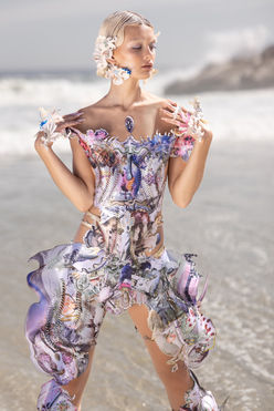 Chelsea Jean Lamm & Ashley Elizabeth Lamm – The Future of Sustainable Avant-Garde Couture
Discover the visionary world of Chelsea Jean Lamm & Ashley Elizabeth Lamm, a high-end couture duo with South African and German roots, redefining wearable art and sustainable luxury fashion. Their avant-garde creations fuse heritage craftsmanship, innovative textile techniques, and cutting-edge materials, making them a rising force in the future of fashion.
Each garment is a masterpiece of sustainability and artistry, featuring reclaimed print media, dead-stock silk, intricate hand embroidery, and experimental fabric manipulation. Chelsea’s couture designs embrace bold silhouettes and sculptural forms, while Ashley’s analogue collage techniques transform discarded materials into layered, textural storytelling.
Their work represents a new era of luxury fashion, where sustainability, innovation, and avant-garde design merge seamlessly. From laser-cut detailing to eco-conscious embellishments, every piece reflects a commitment to modern craftsmanship and ethical production.
For those seeking trendy, high-end, and concept-driven couture, their collections are the epitome of sustainable luxury. Explore their wearable art, statement couture, and fashion-forward designs—crafted for individuals who embrace artistic expression and the evolution of high fashion.