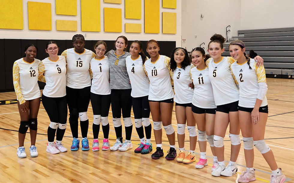The Lady Cane JV Volleyball team, all smiles in the new gym. Photo Credit: Hiram Lupton