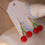 Thumbnail: Beaded glass cherry earrings wit gold findings 