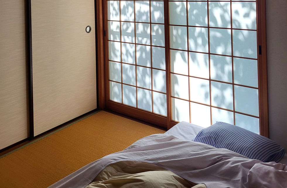 a traditional Japanese room with a futon in the morning in Tokyo, Japan