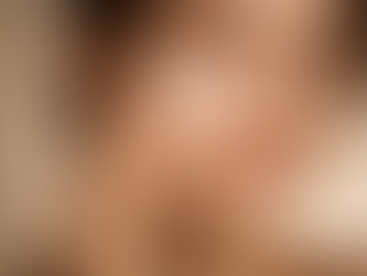 woman apply skincare product unto face