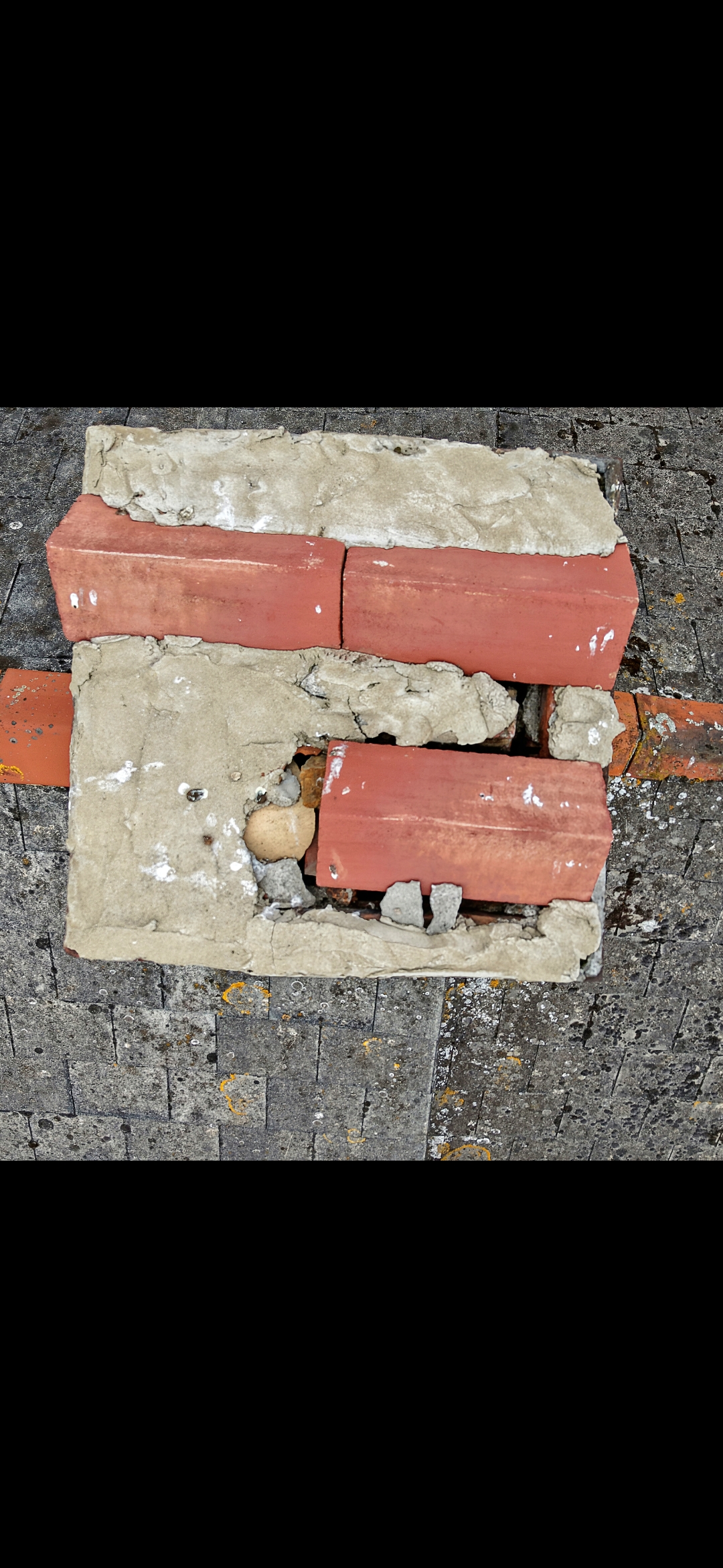 Close-up view of chimney brickwork and mortar