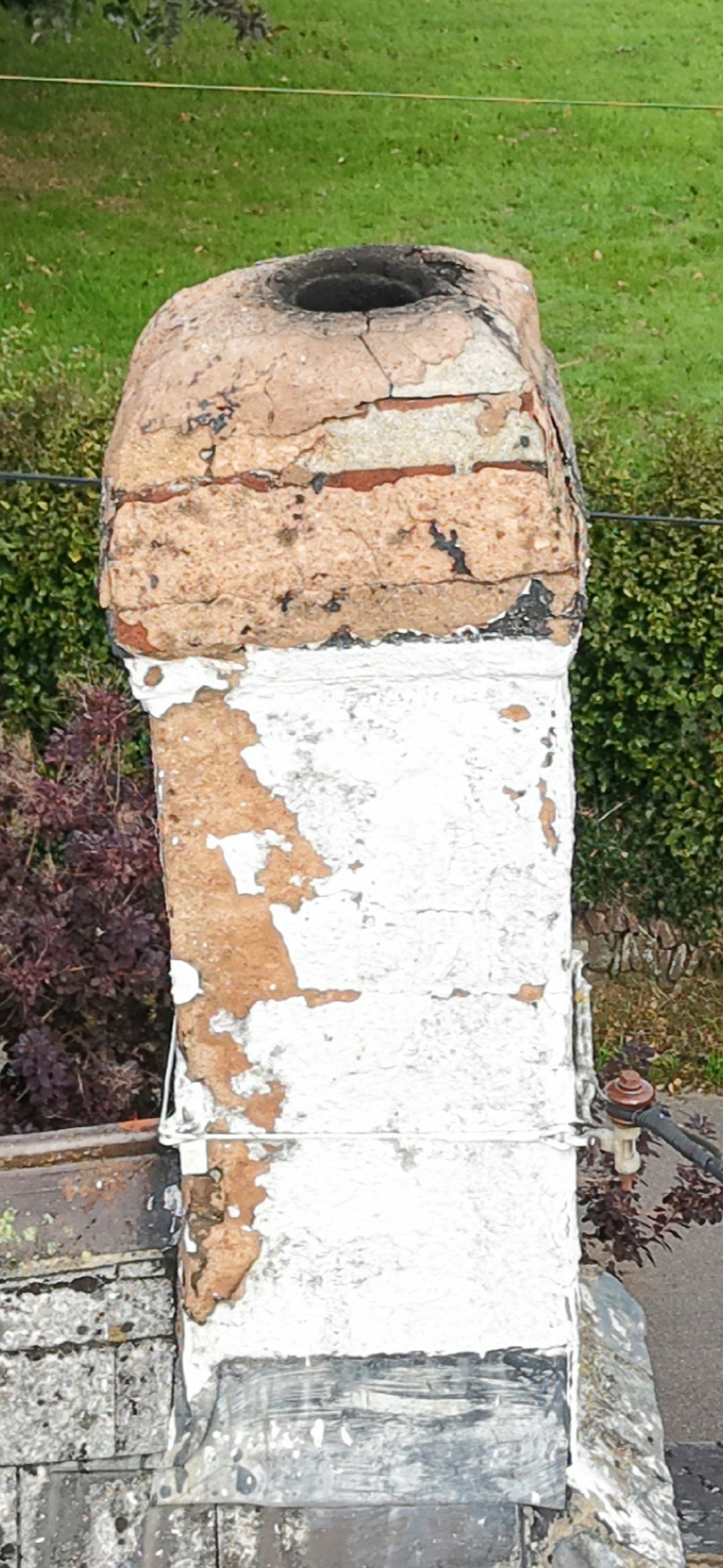 Close view of chimney masonry recorded for inspection