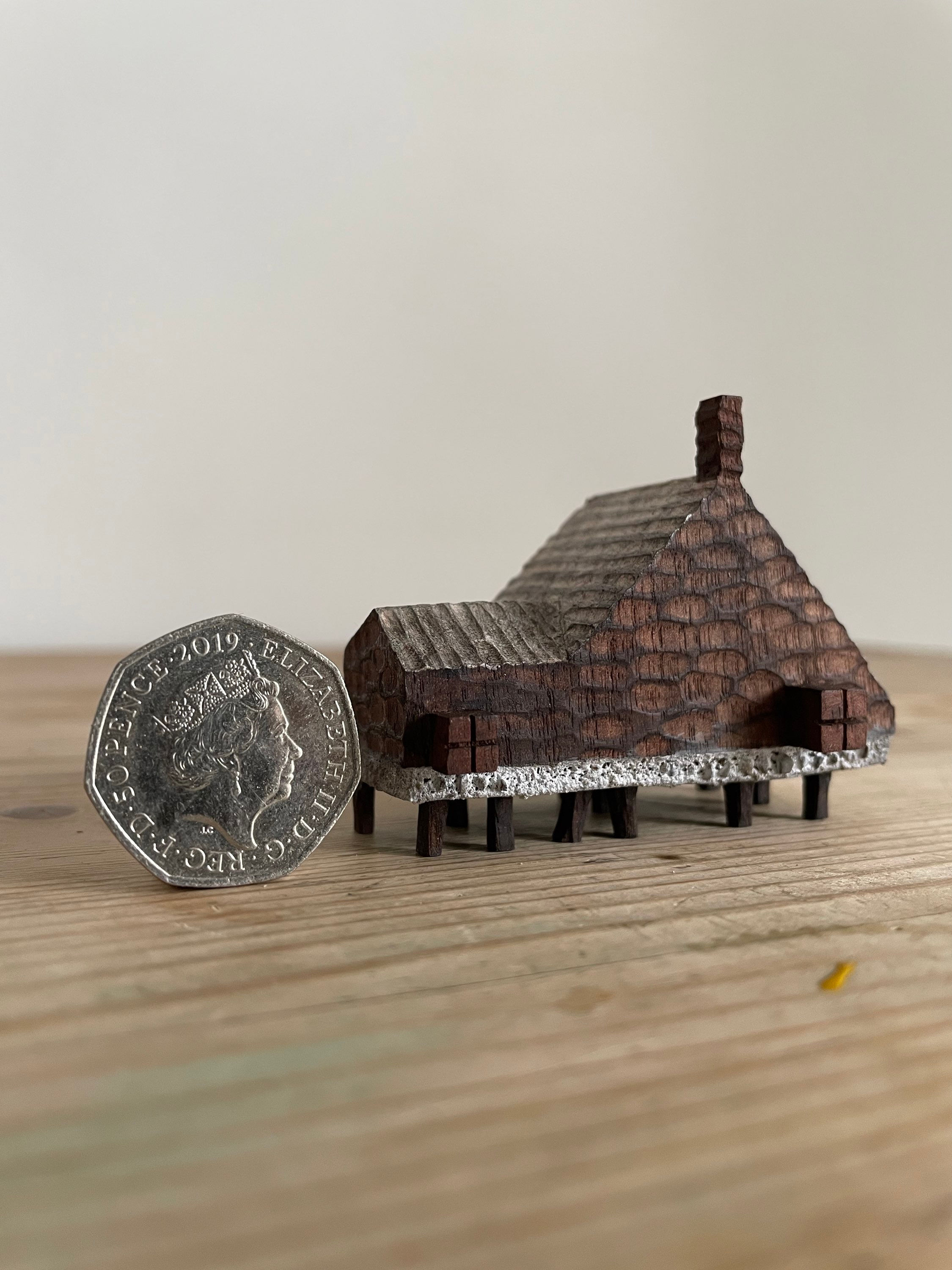 Tiny cottage with 00 legs
