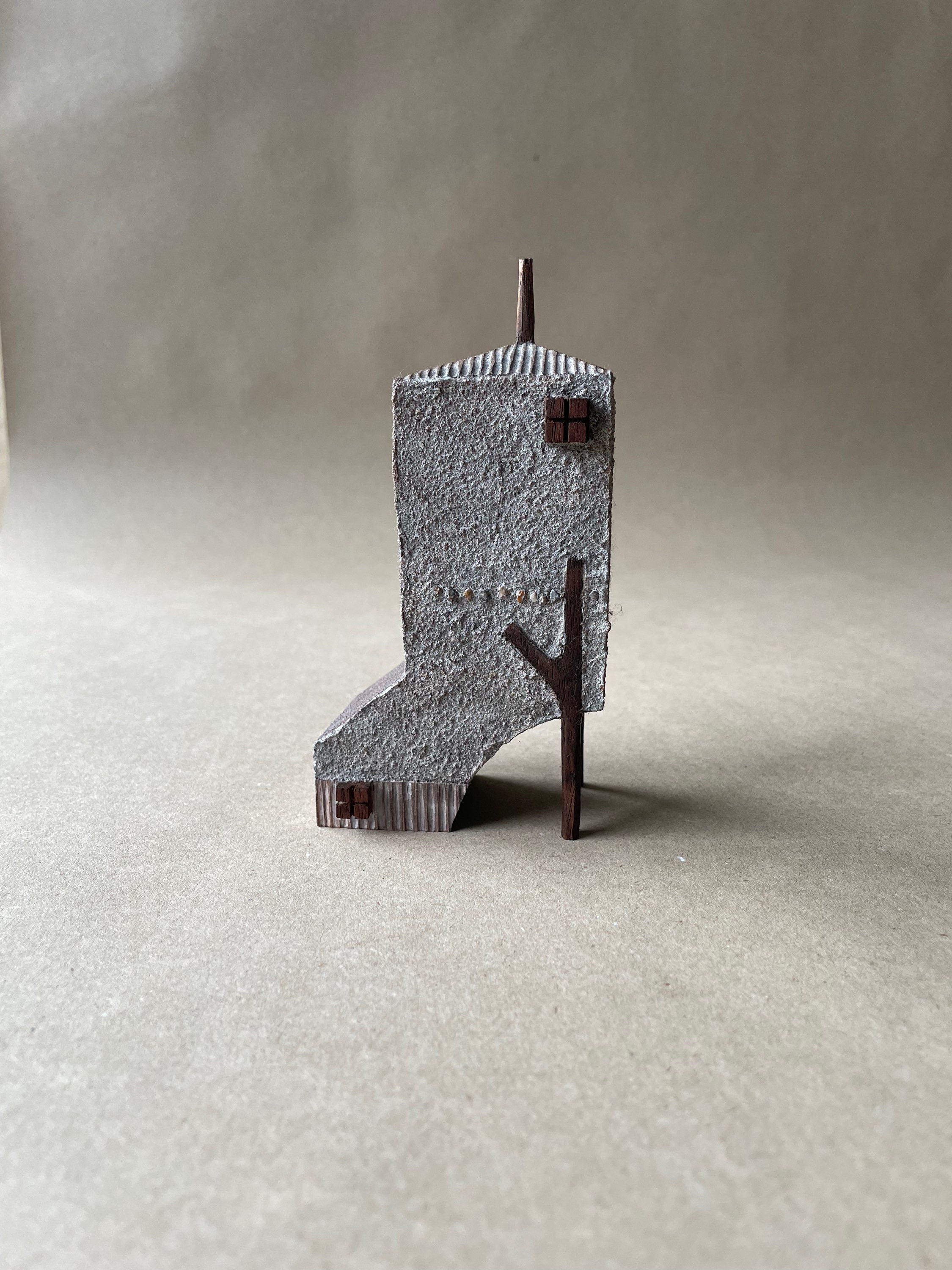 Mud house in branches