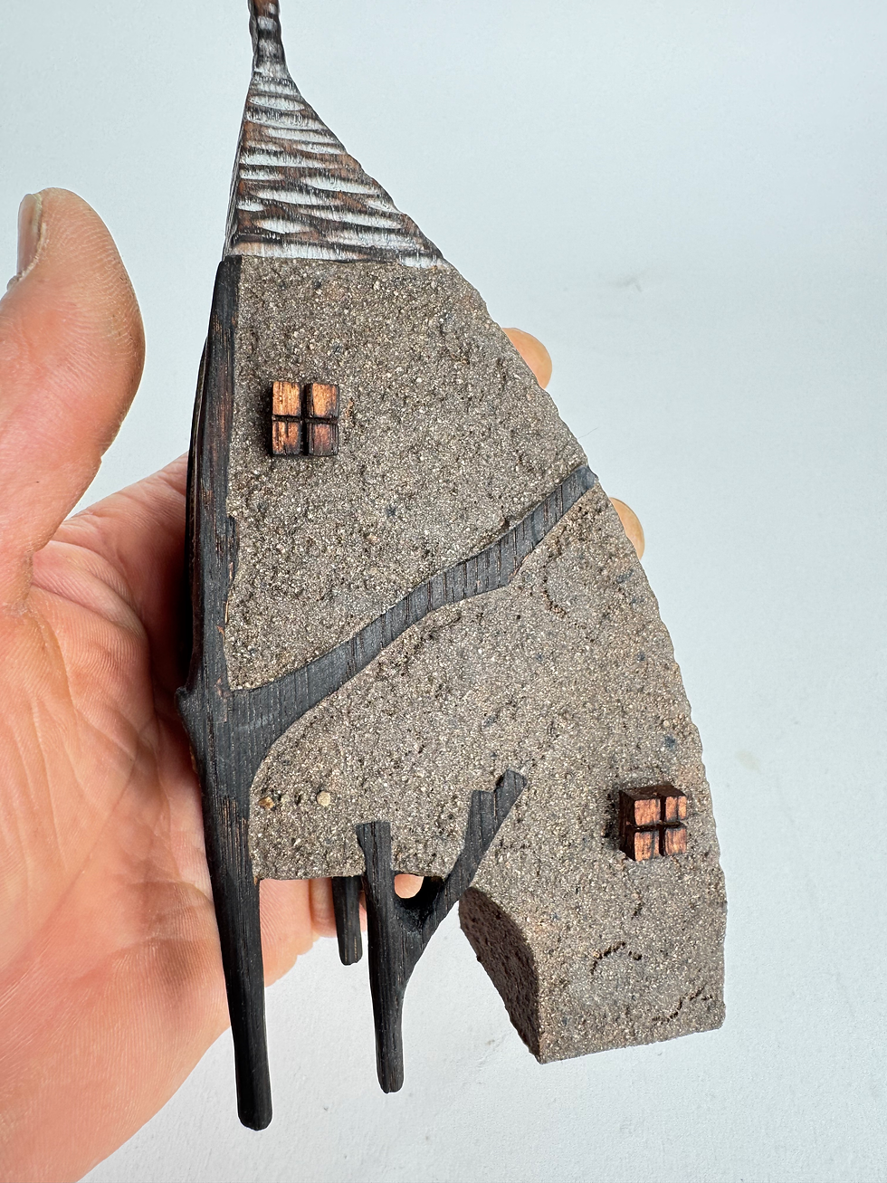 Thumbnail: Mud house in the branches 