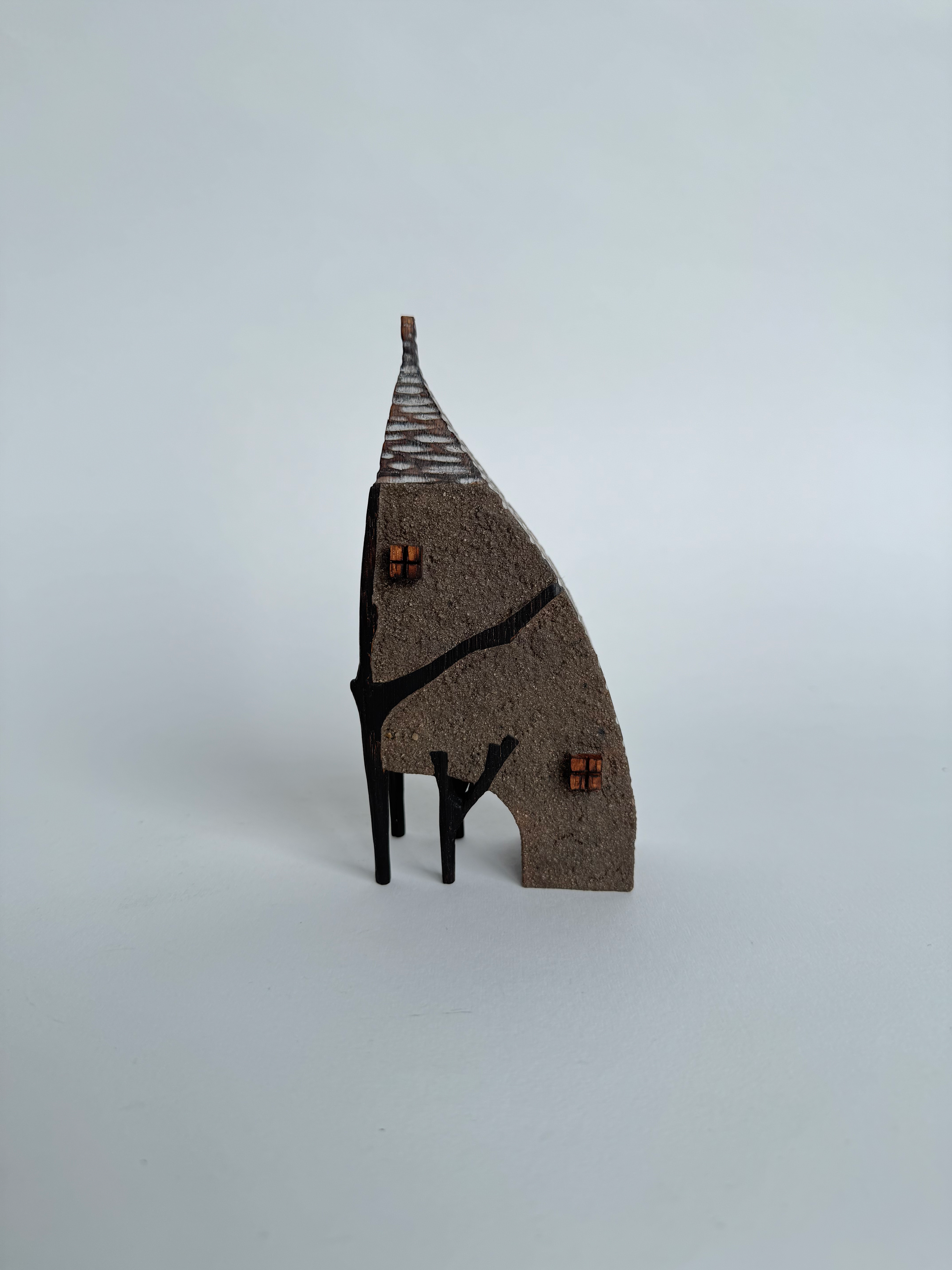 Mud house in the branches