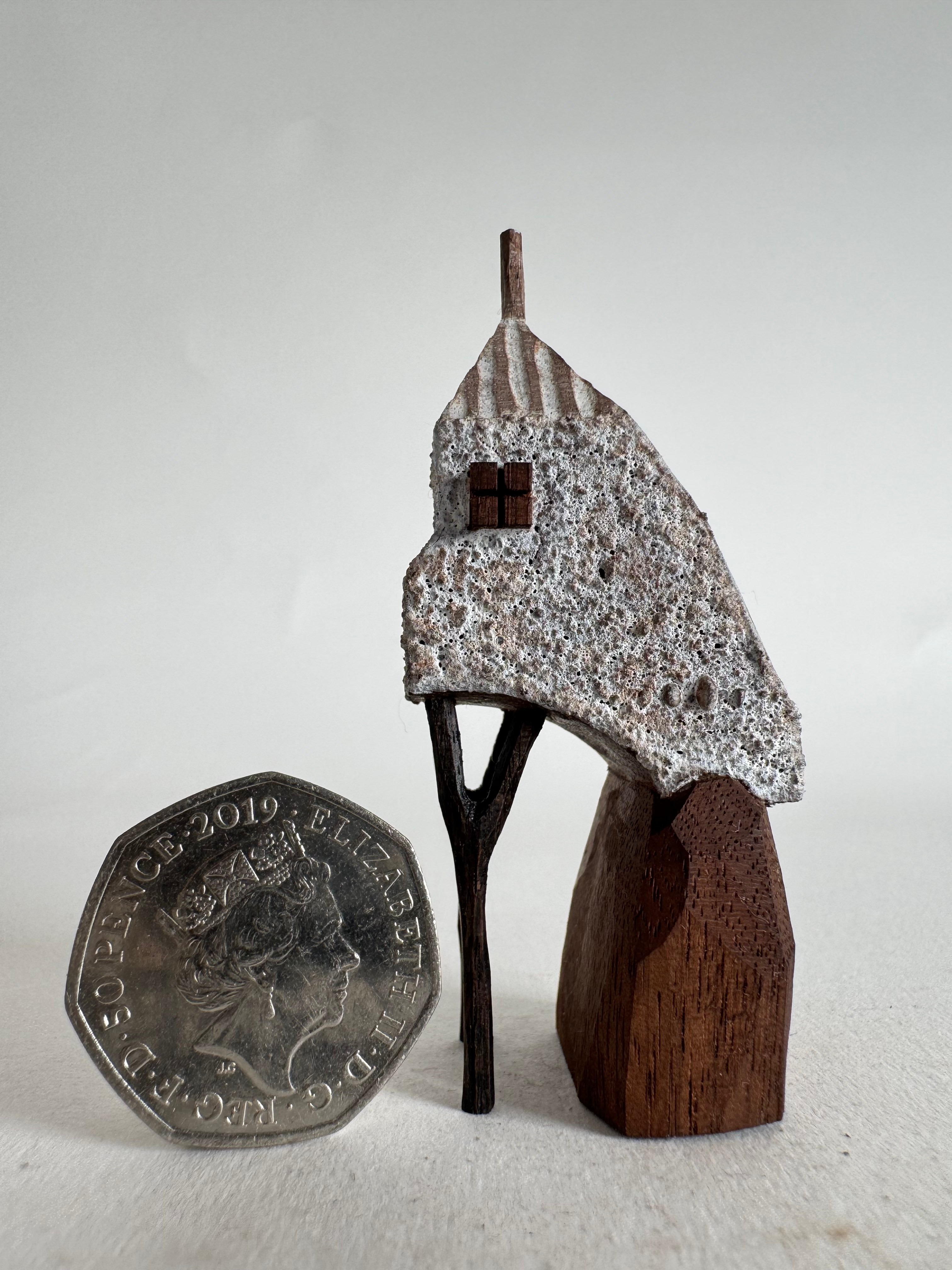 Teeny treehouse on the boulder