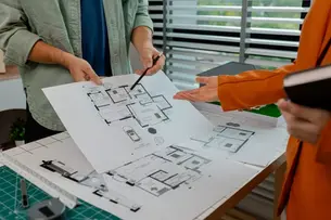 An architect and engineer work as a team