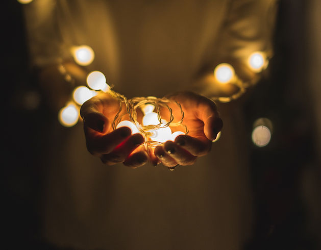 Hands Holding Lights_edited.jpg