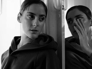 A woman listening to her twin - or is it her subconscious?