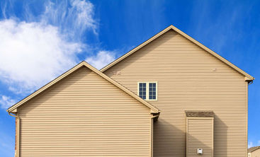 new-home-showing-vinyl-siding-and-gutters-185222943-1185746173784f55b84e2df8a54f09a5.jpg