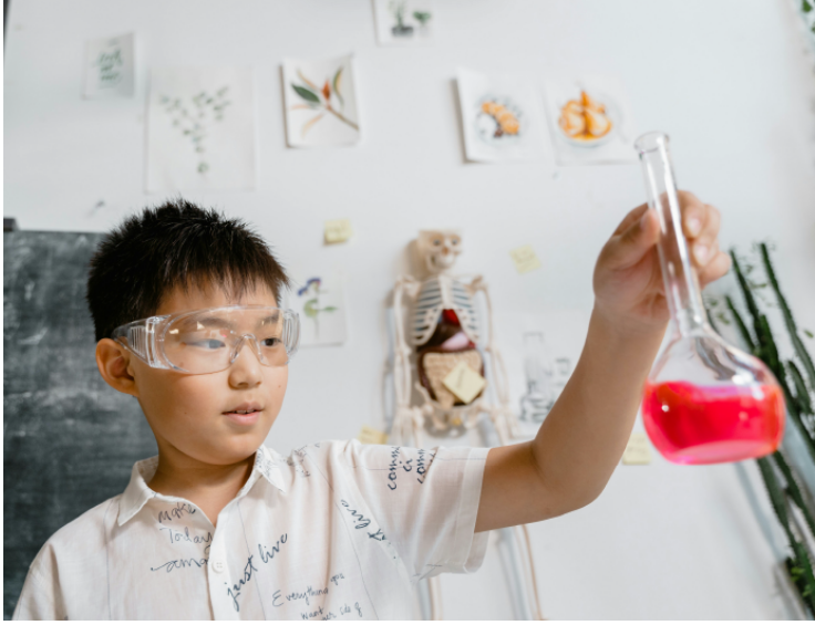 A child holding a flask
