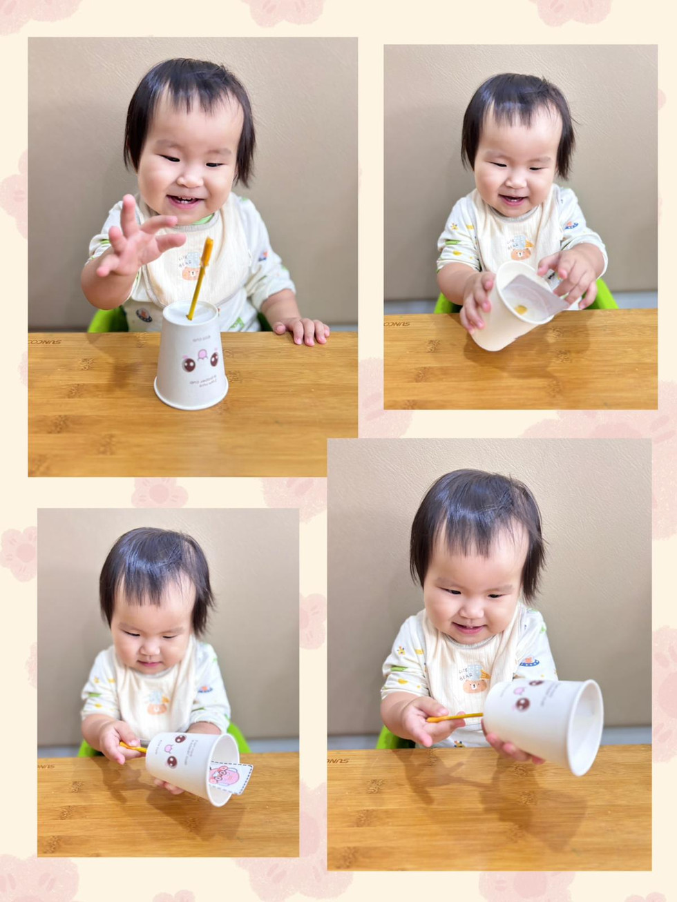 A happy baby exploring a cup and pencil.