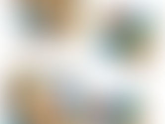 A baby exploring colorful scarves during playtime.