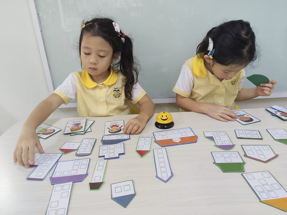 Children learning number recognition through a fun matching activity.