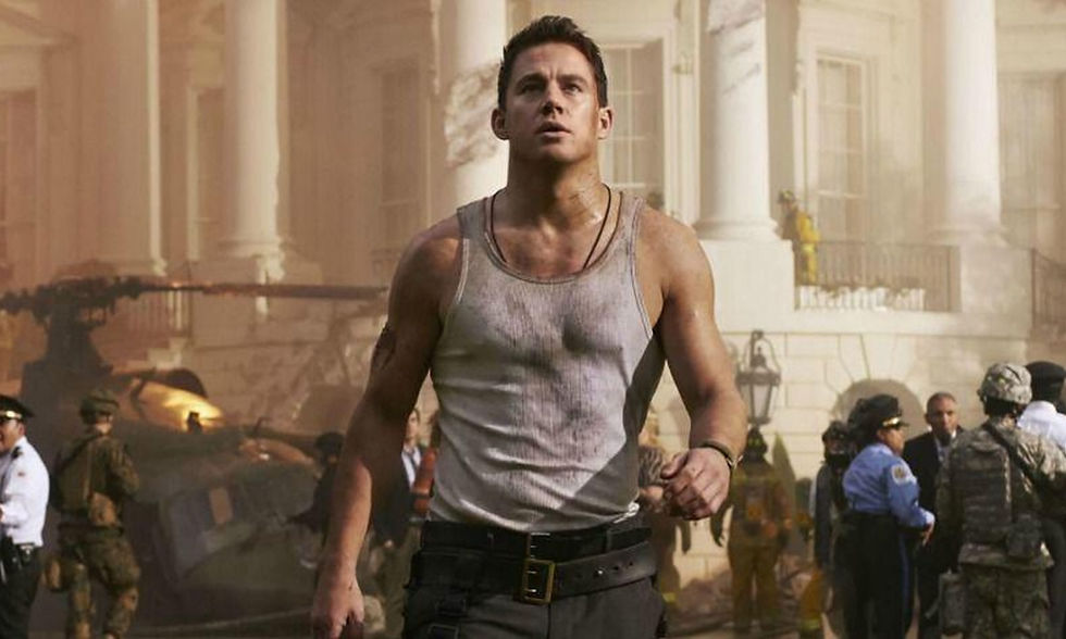 Channing Tatum, dirty tank top, explosion, dark hair, muscles, brown belt, green pants