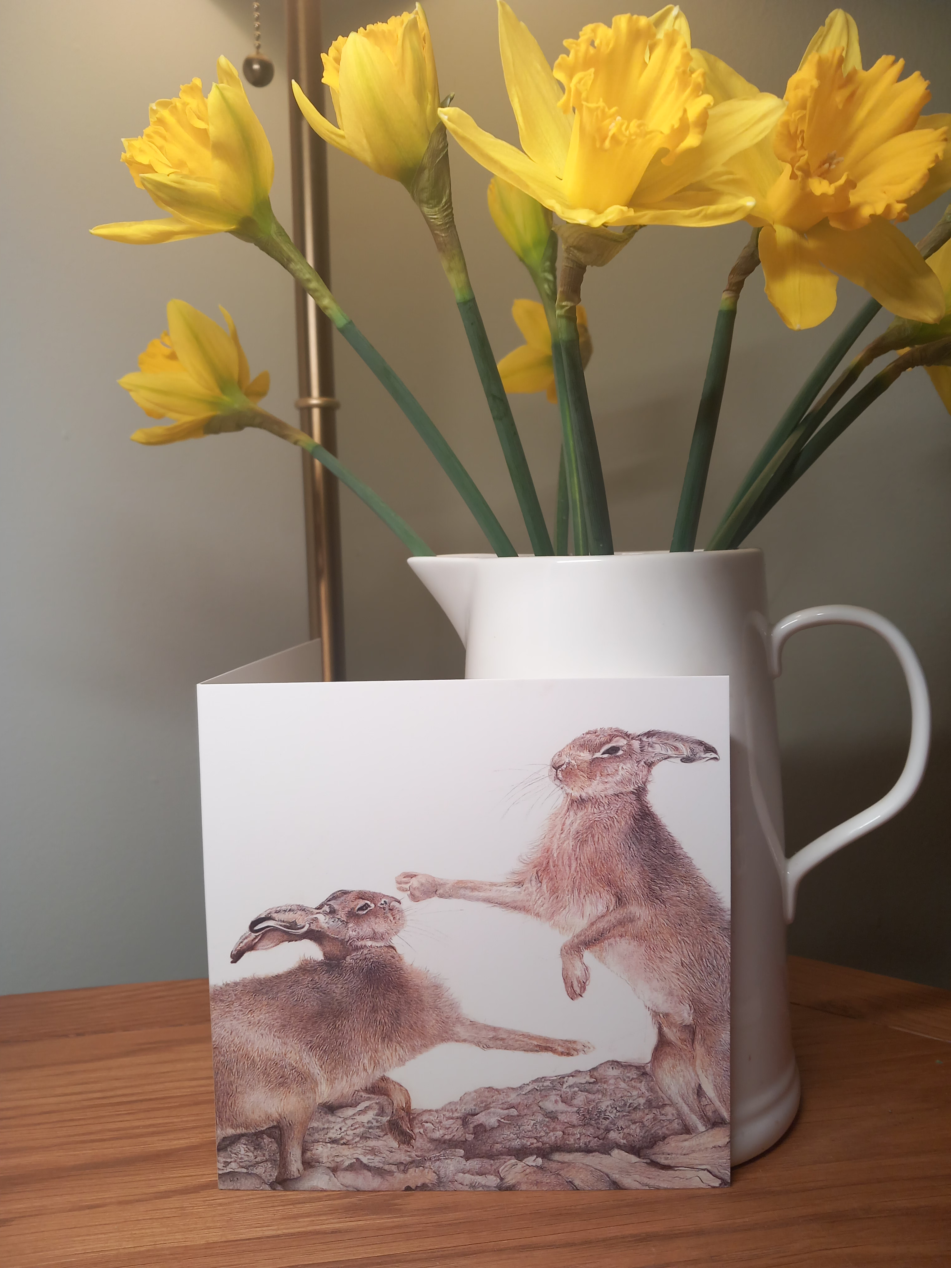 Boxing hares Greeting card