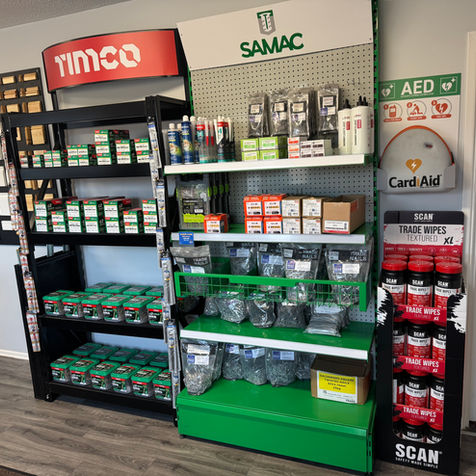 Retail store display with Timco, Samac hardware, fasteners, and AED Card Aid supplies.