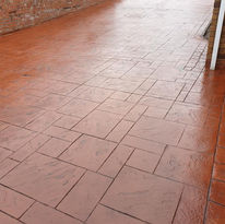 red coloured imprinted concrete
