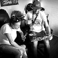 two people looking at laptop