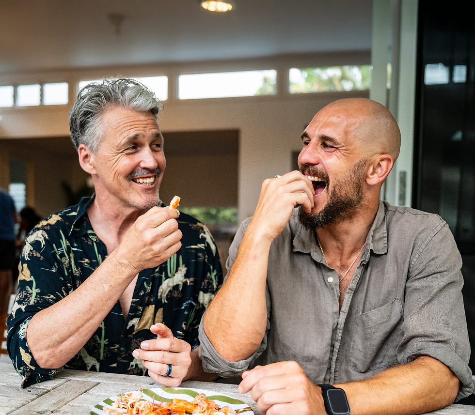 Two men with seafood