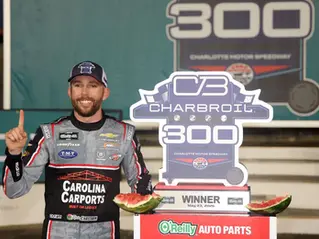 Ross Chastain survives weather nightmare to score first win with Dale Jr.’s JRM in rain-shortened Charlotte race.
